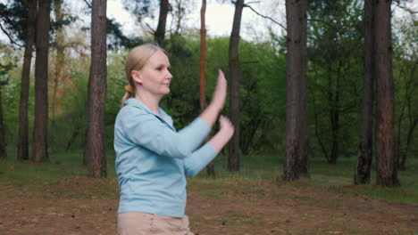 woman exercising in a forest