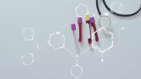 Animation-of-dna-strand-diagrams-over-blood-test-tubes