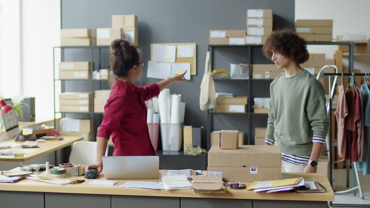 People packing boxes in a post office