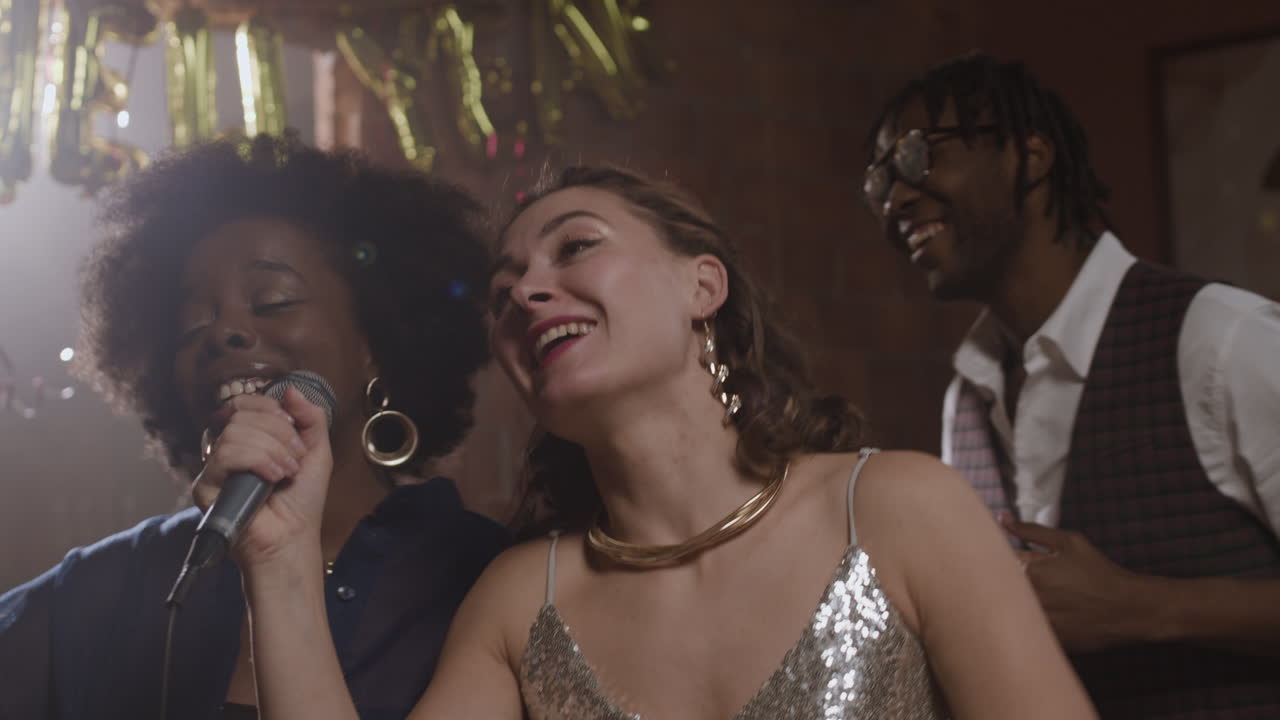 Friends Celebrating and Singing at a Party