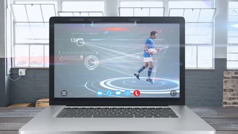 Animation-of-laptop-computer-showing-a-male-rugby-player-catching-a-ball.-Coronavirus--spreading.-