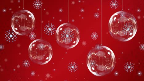 animation of christmas balls over snowflakes on red background