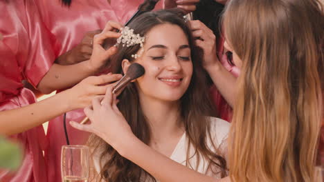 Close-Up-View-Of-Bride-Sitting-And-Drinking-Champagne-Glass