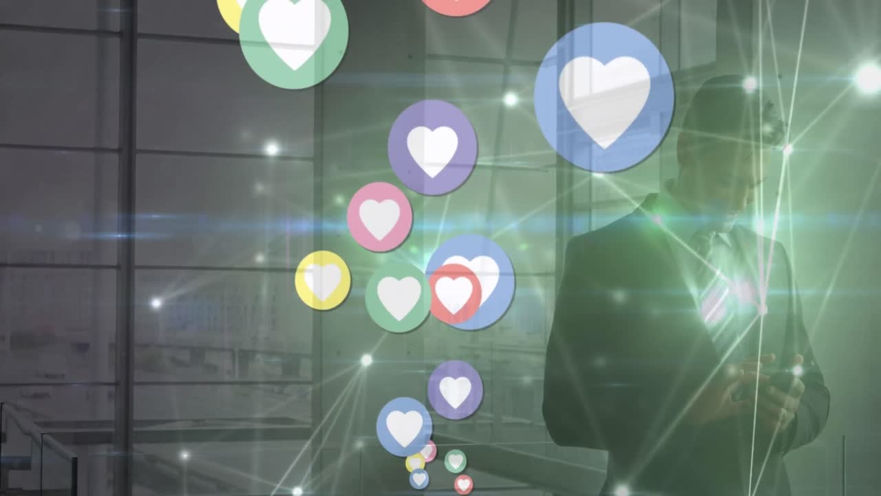 사무실에서 스마트폰을 사용하는 백인 사업가 위에 떠다니는 심장 아이콘의 애니메이션