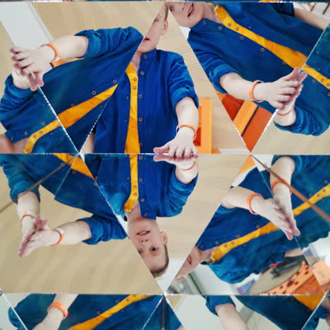 boy's hands guestures in many parts of kaleidoscope reflection. geometric design of a happy child playing on the background of mirror in kaleidoscope