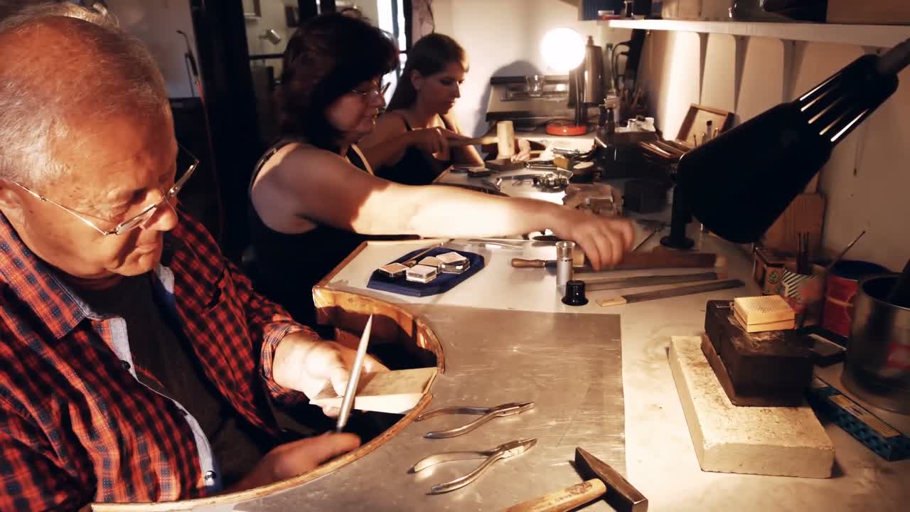 Goldsmith shaping wood