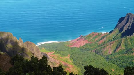 HD-Hawaii-Kauai-slow-motion-static-of-a-beautiful-elevated-ocean-view-from-Pu'u-O-Kila-Lookout-with-the-wake-of-a-boat-visible-in-the-distance-in-right-center-frame