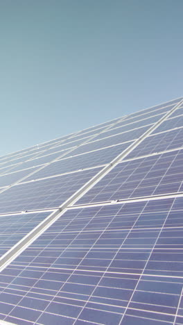 solar panels covering roof of building, vertical slider shot with copy space