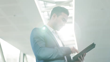 Office,-businessman-and-tablet-with-lens-flare