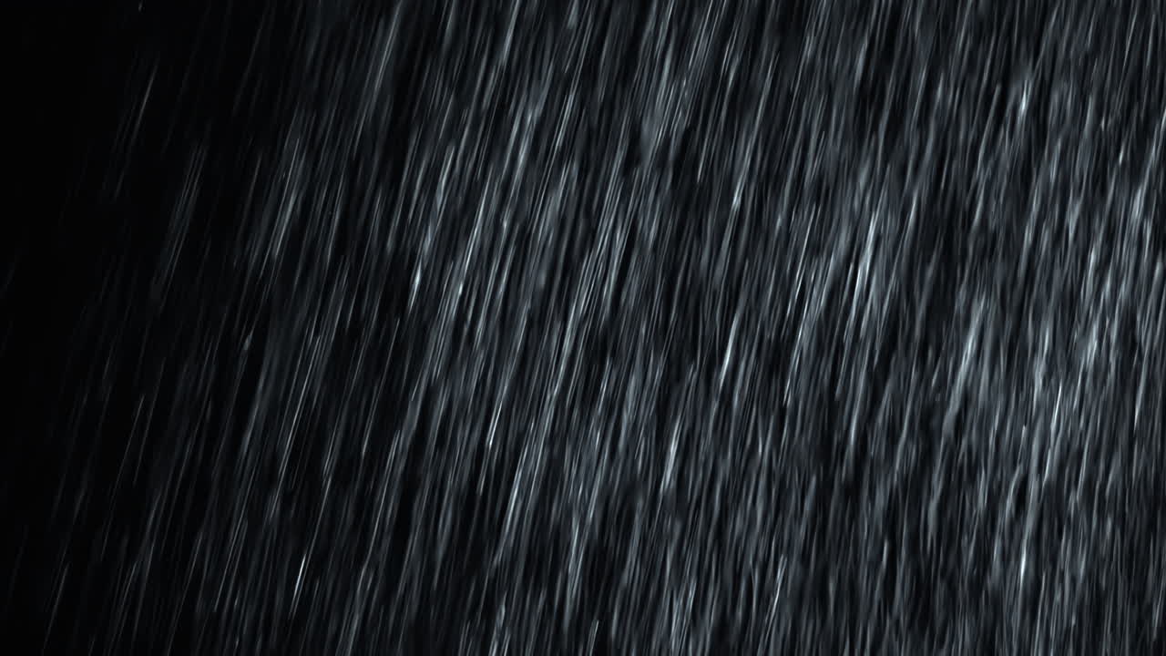 Loopable heavy diagonal rainstorm in 4K high-speed footage