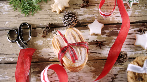 sweet food and christmas decoration on wooden table 4k