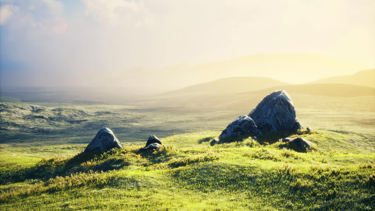 Serene landscape with rocks under soft sunlight at dusk
