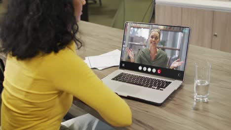 Video-of-biracial-woman-having-video-call-on-laptop