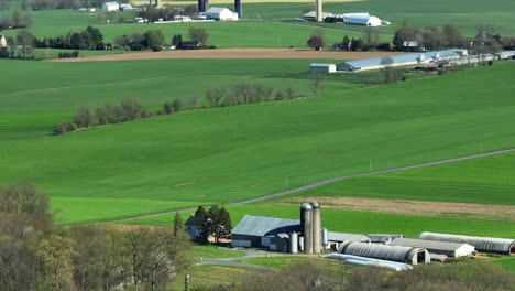 drone wide shot showing many farms in rural area of illinois, usa