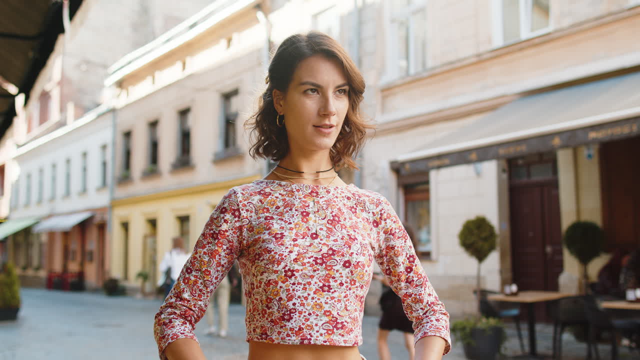 Woman taking a deep breath of fresh air relaxing taking a break resting meditating outdoors