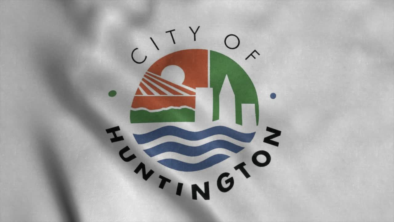 Bandiera di Huntington City, Virginia Occidentale, che sventola al vento. Sfondo realistico con bandiera.