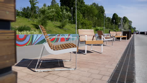 modern park benches along a paved walkway