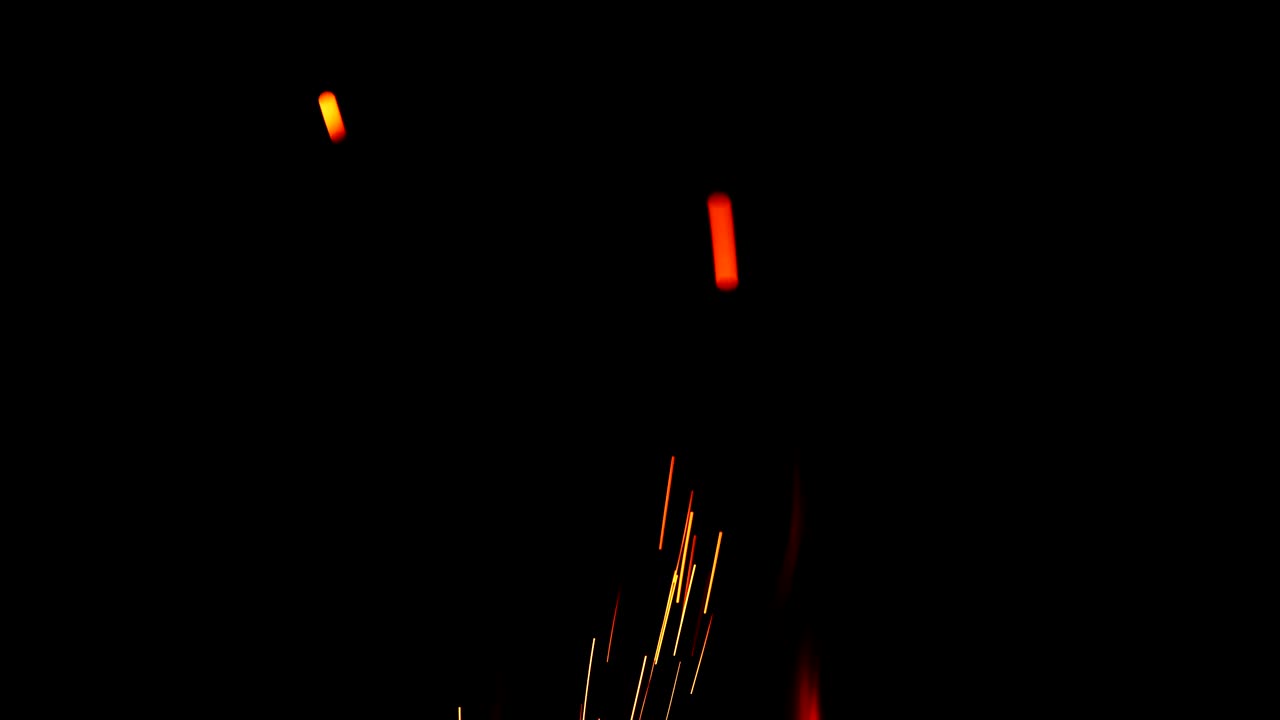 llama en la oscuridad