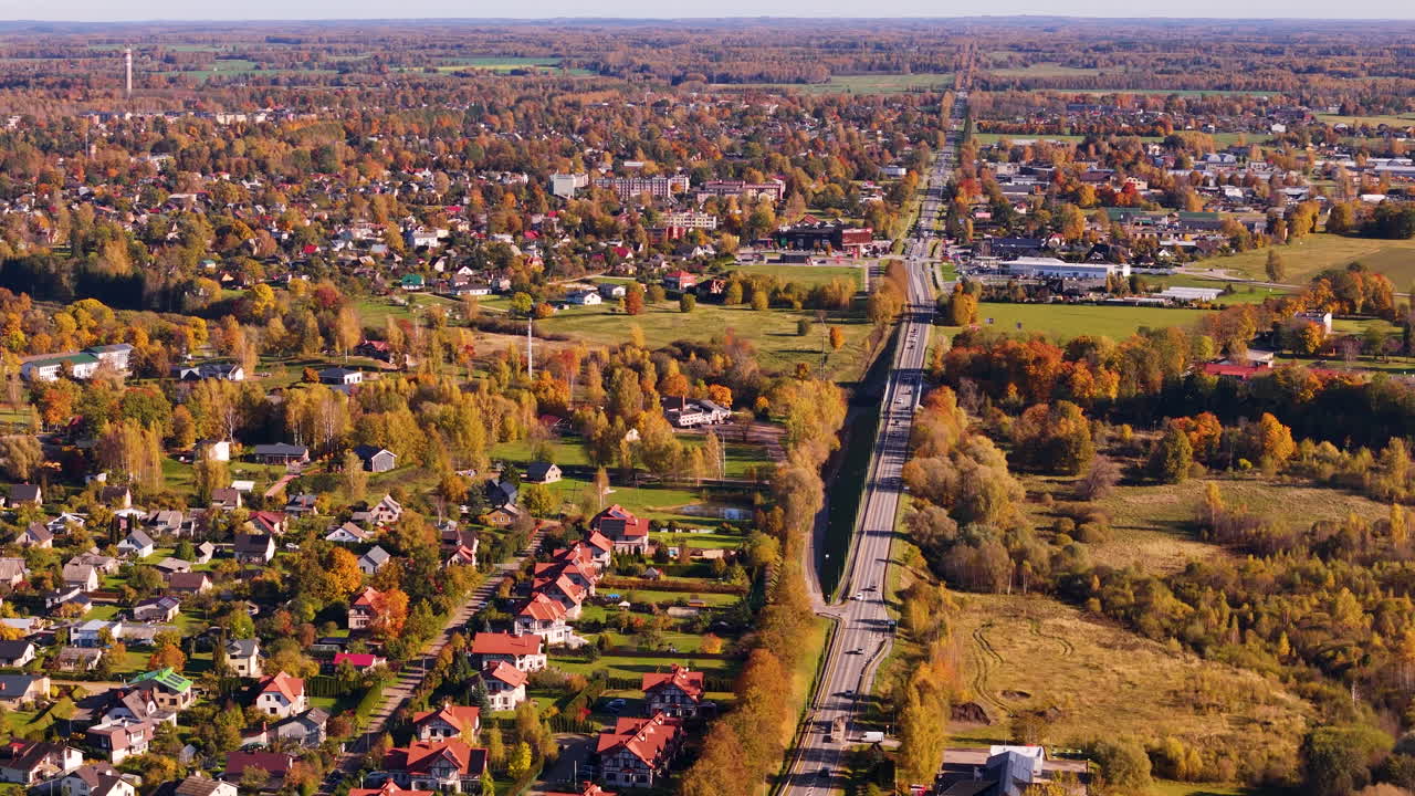 Latvia township in autumn colors, aerial panoramic view