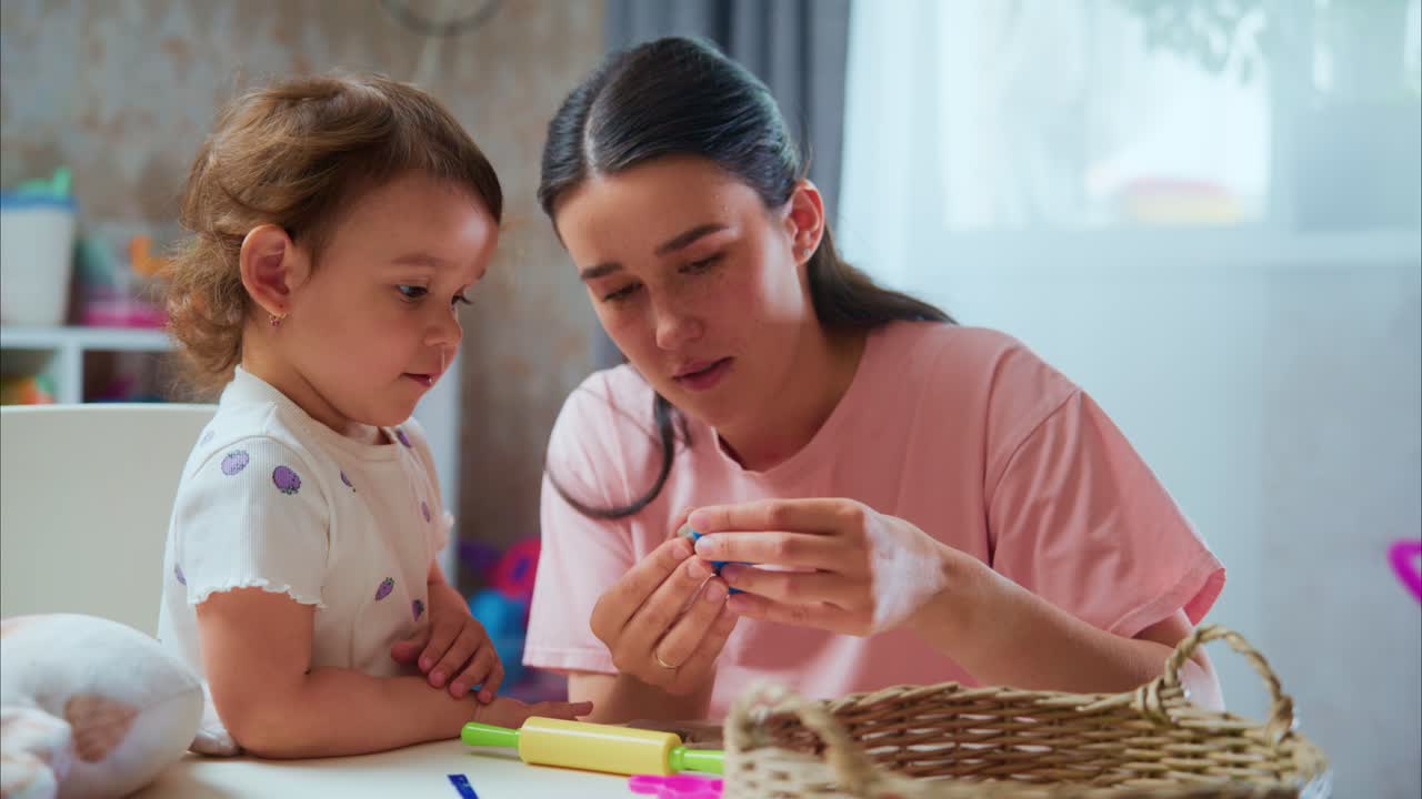 A Heartwarming Moment Between Mother and Child: Engaging in Creative Play with Colorful Toys and Imagination at Home