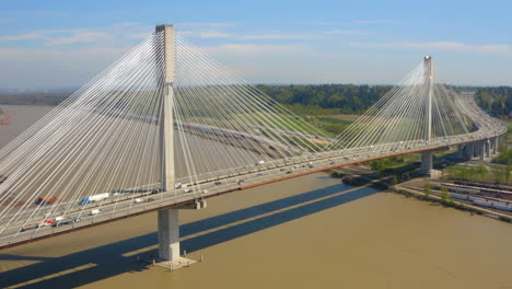 incredible aerial view of the port mann bridge connecting surrey and coquitlam, british columbia