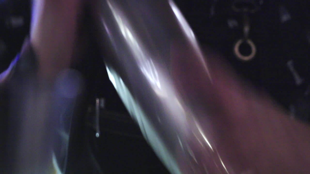 Beautiful shot of a bartender shaking a container