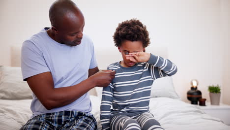 Father,-love-and-crying-kid-on-a-bed-with-stress