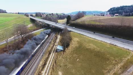 pacific br01 01 202 steam locomotive train traveling cross country in switzerland