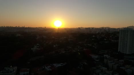 Flying-towards-the-sunset-in-wooded-neighborhood-in-São-Paulo---Brazil-2