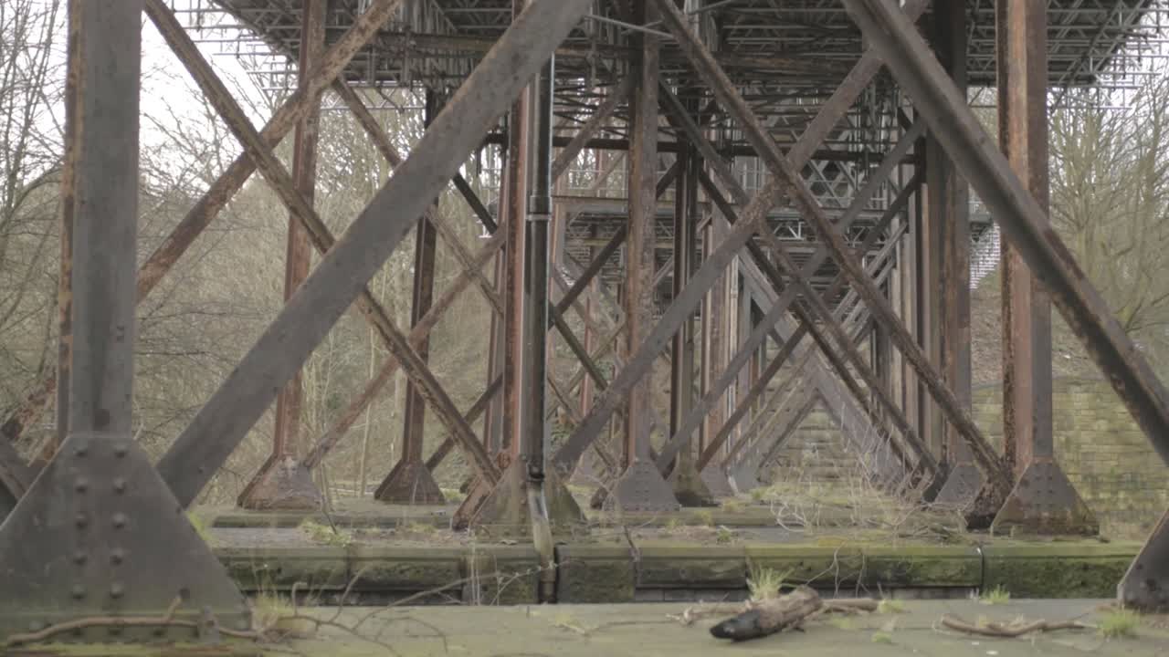 Old disused railway bridge viaduct metal support girders