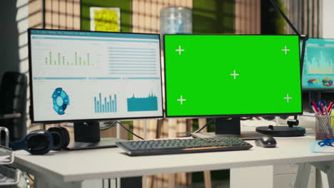 high end empty office displaying chroma key on pc monitor at desk