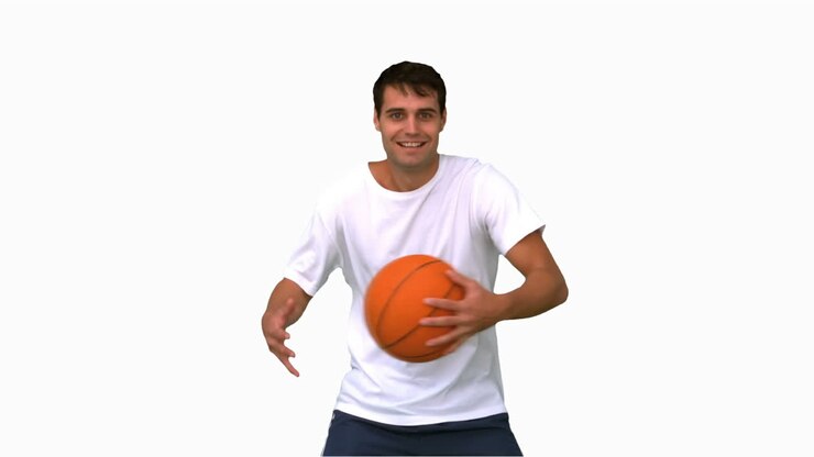 Man playing and dribbling with a basketball on white screen