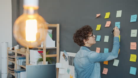 woman planning and brainstorming in office