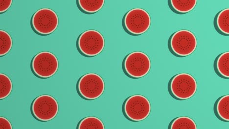 rotating watermelon slices. pattern on green background