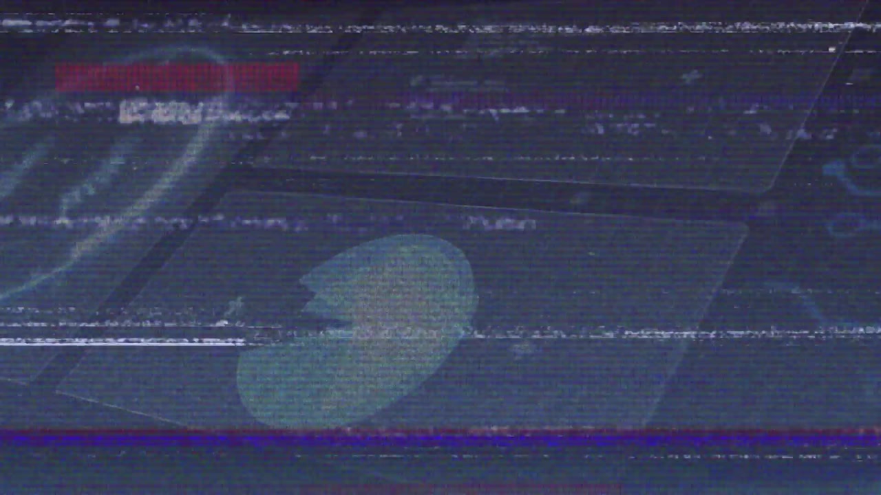 On interface load glitch lines drifting across UI revealing circular icon behind flickering noise