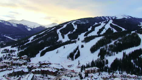 colorful sky by a sunrise behind the copper mountain at winter