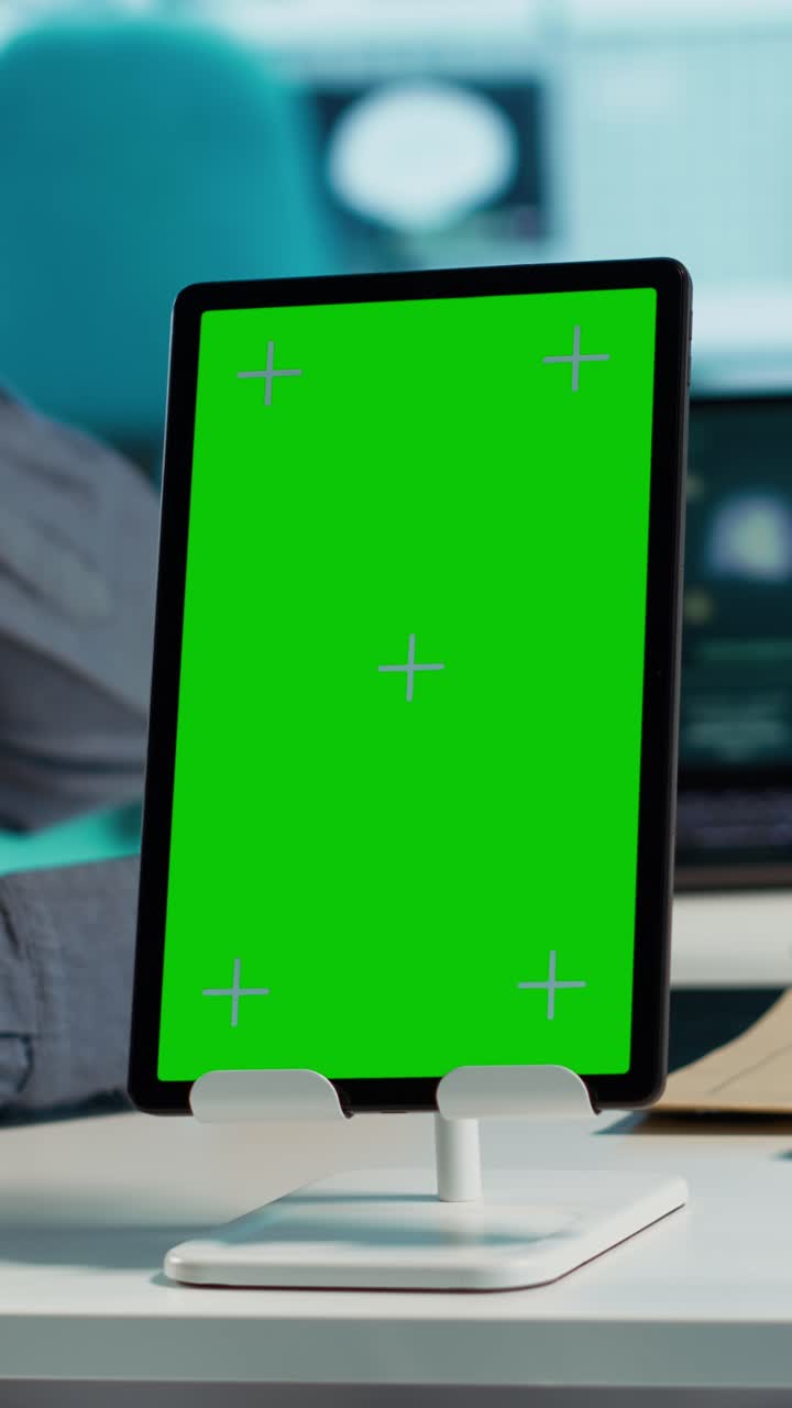 Vertical Tablet with Green Screen Mockup on Office Desk