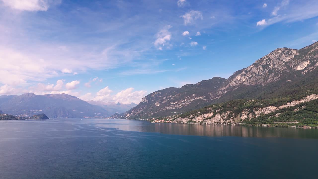 Fly sideways over south east Lake Como, summer time
