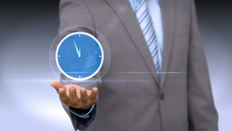a businessman holding virtual clock