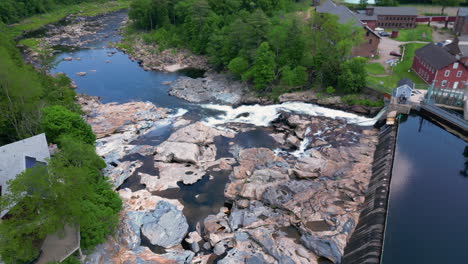 aerial pullback of natural geologic formation of shelburne falls potholes in deerfield river, massachusetts, usa