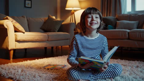 child reading a book in a cozy living room