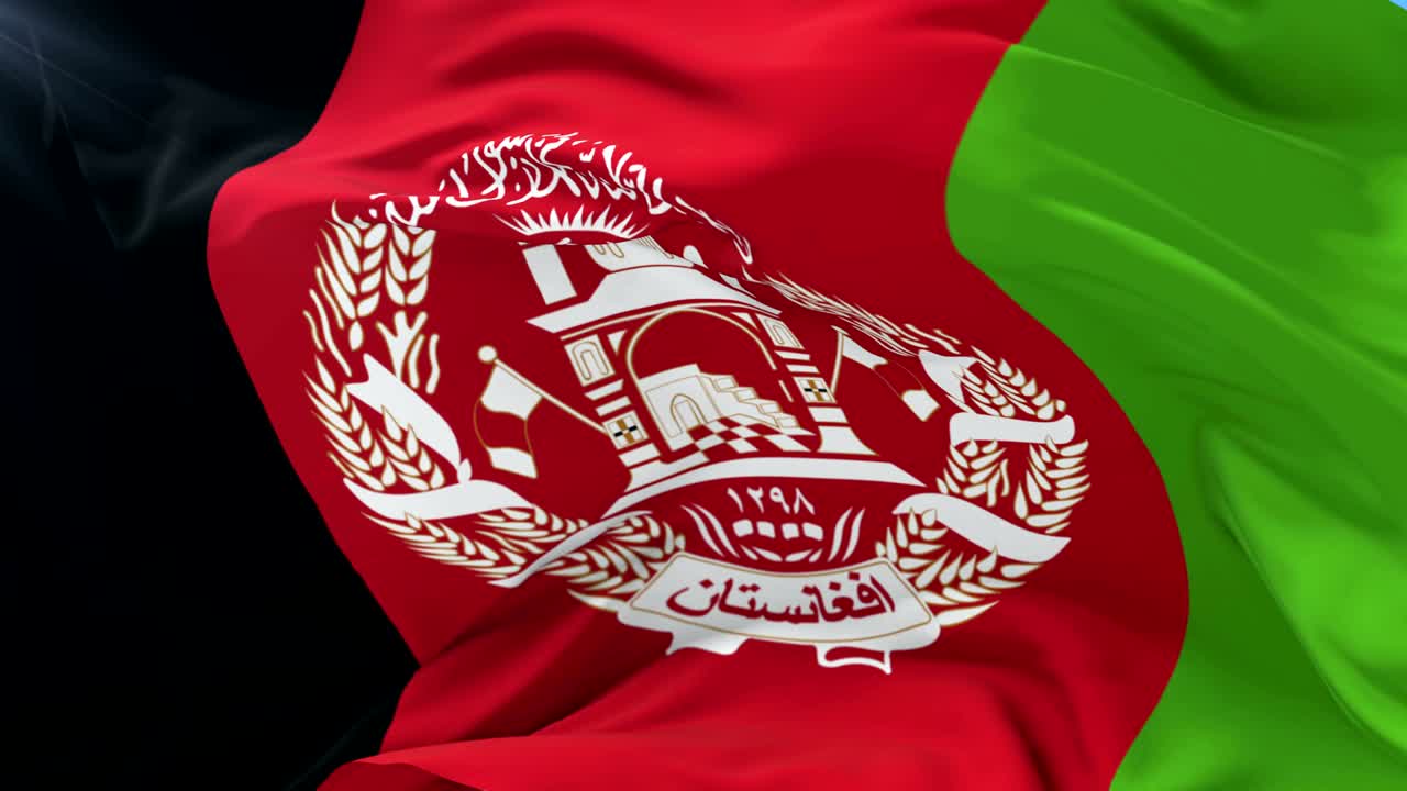 Afghanistan flag waving at wind in slow with blue sky, loop