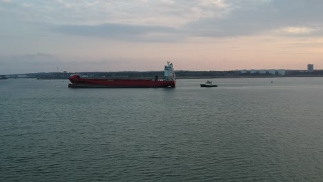 tanker boat sailing past with a tug