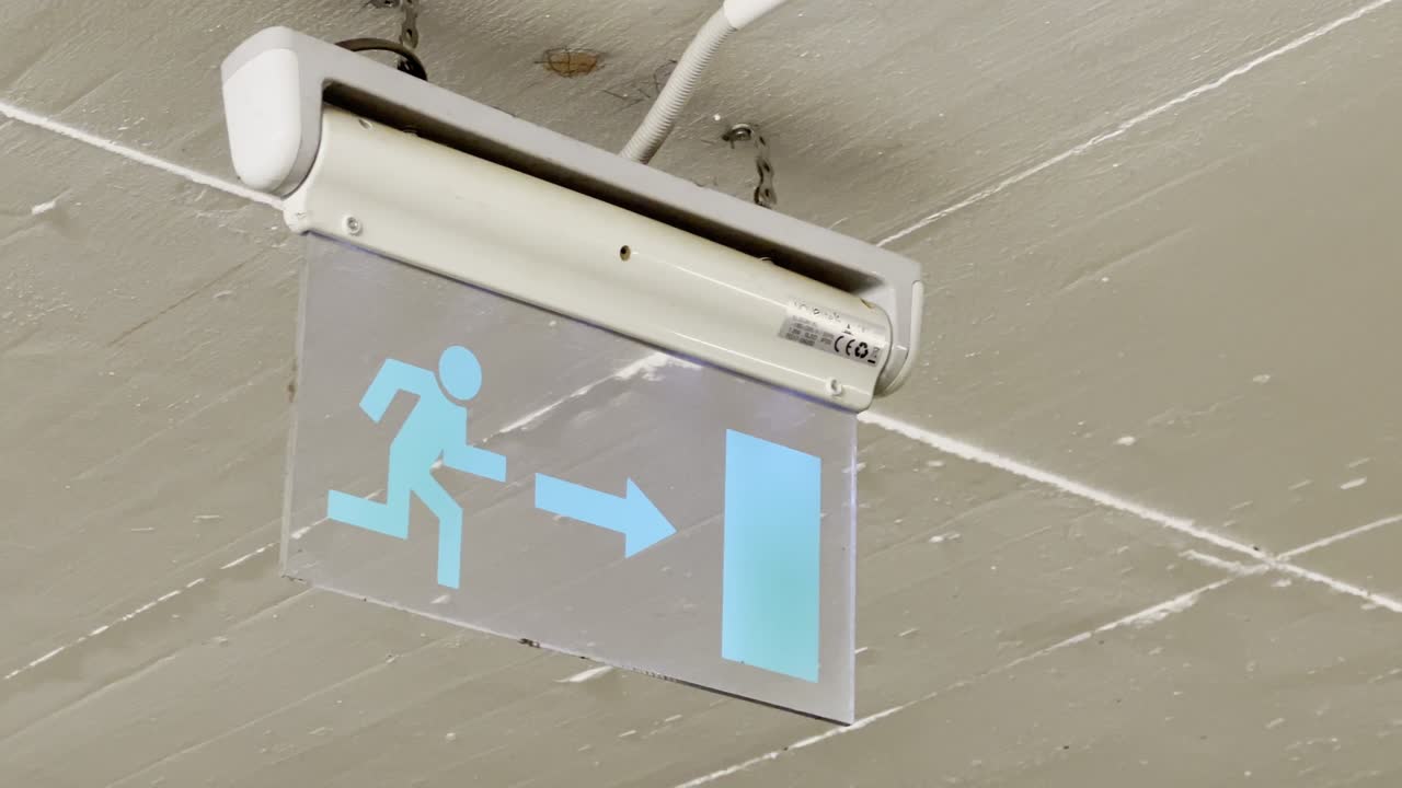 A close-up of a sign indicating "towards exit"