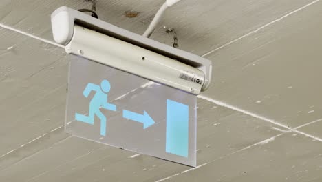 a close-up of a sign indicating "towards exit"
