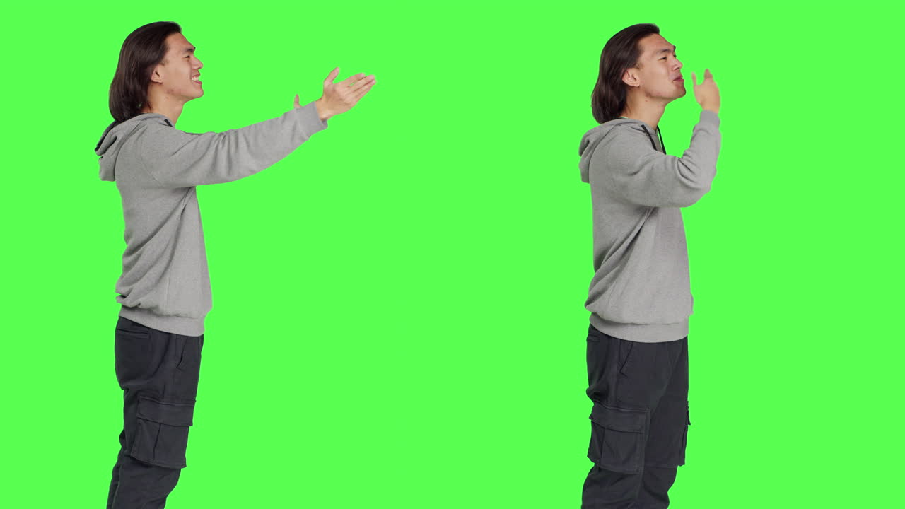 카메라에 공기 키스를 보내는 아시아 남자