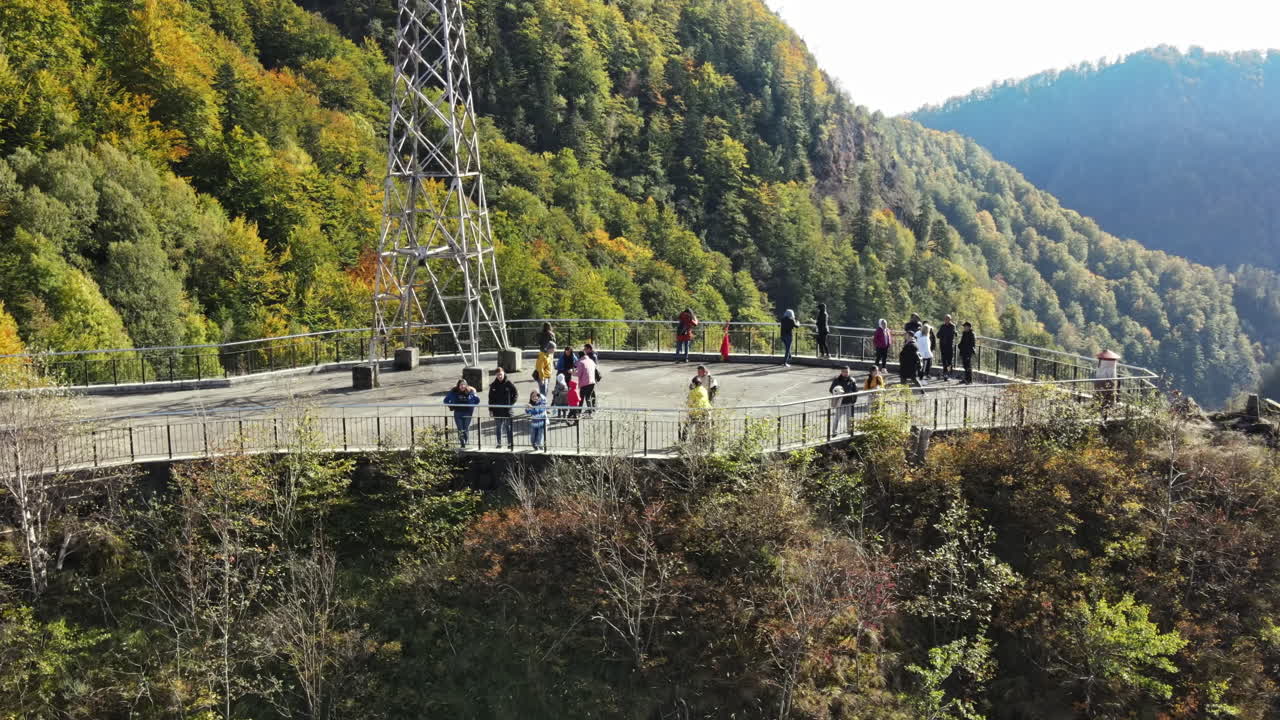 Observation point with mountain views and autumn foliage