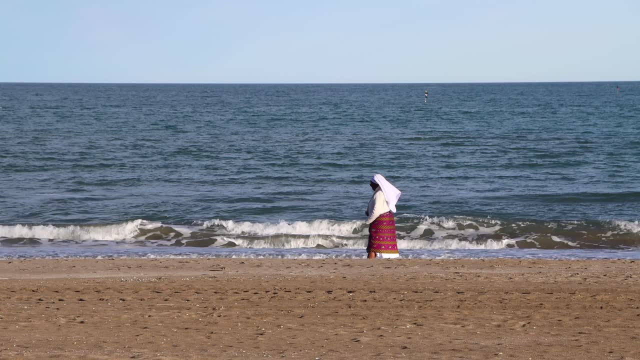 The nun that walks in the beautiful sea.