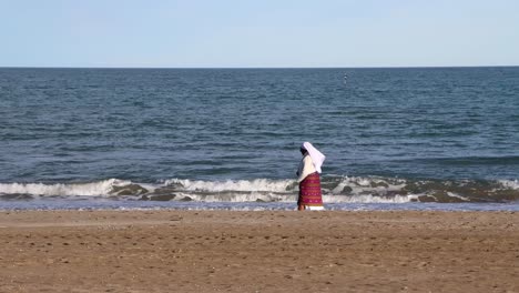 the nun that walks in the beautiful sea.
