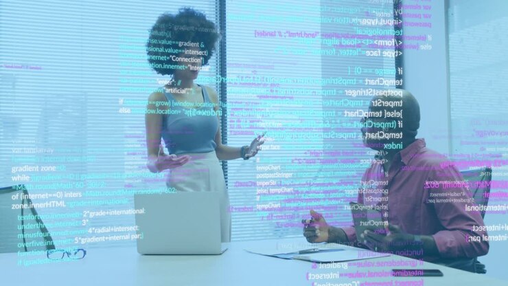 Woman leaning over laptop and tapping keyboard, initiating code overlay while reviewing tech report